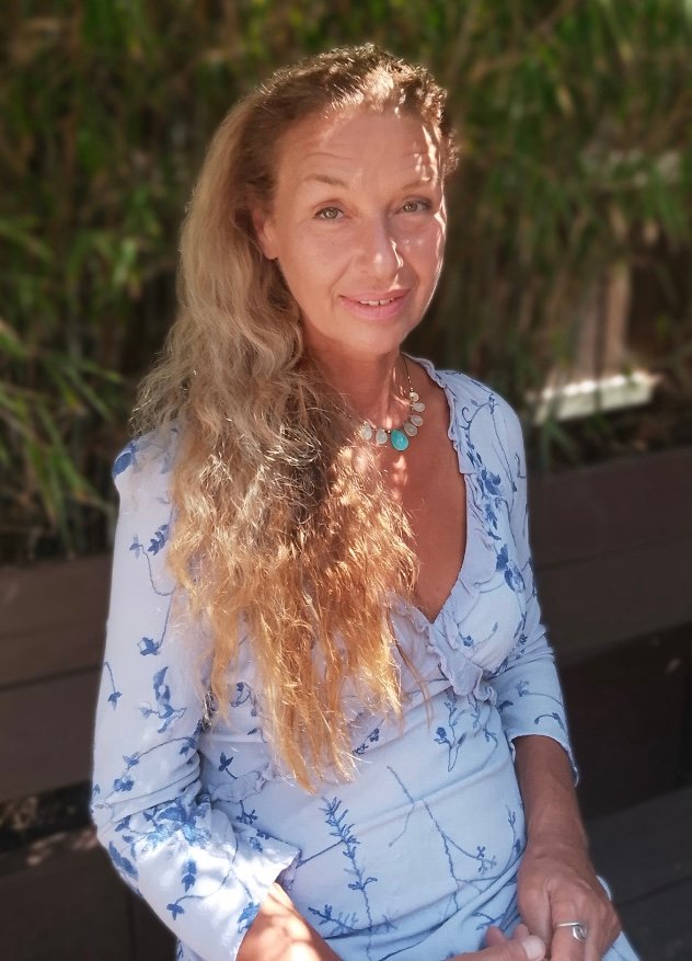 Dr. Virginia Mortimer consulting with patient